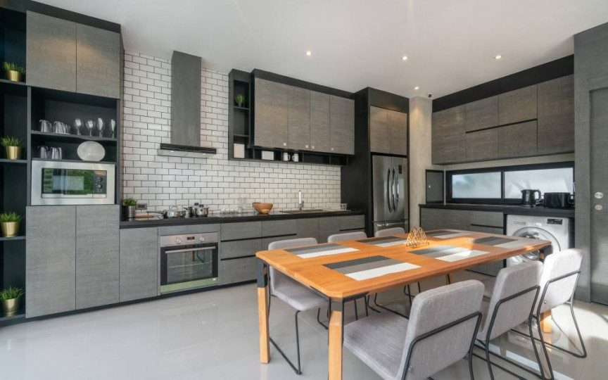 Amenajarea bucătăriei deschise: cum să integrezi spațiile pentru un look modern