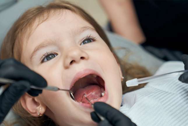 Factorul hormonal care accelerează erupția dinților de lapte la copii